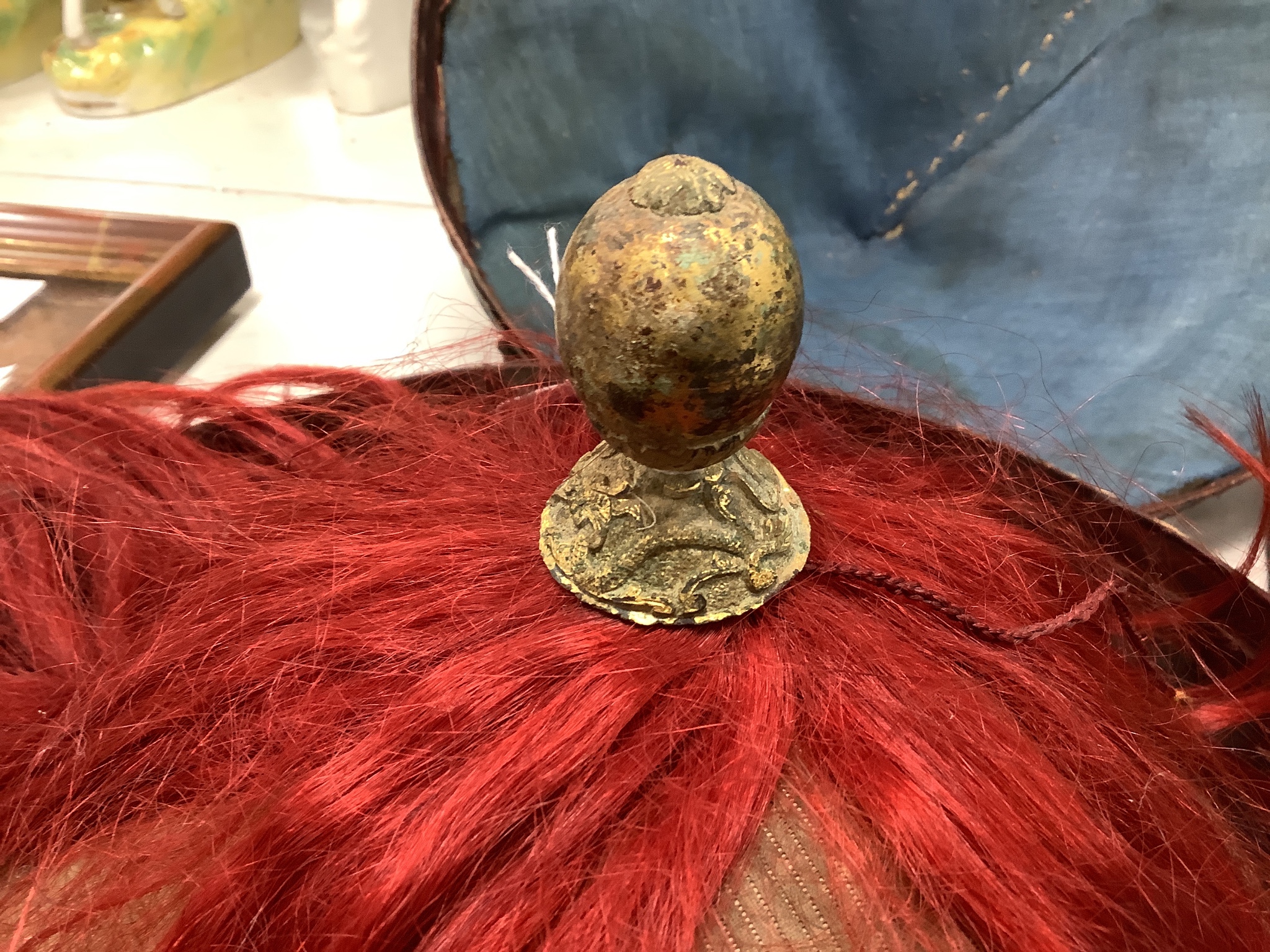 A Chinese late Qing mandarin hat, with gilt finial and original hide case